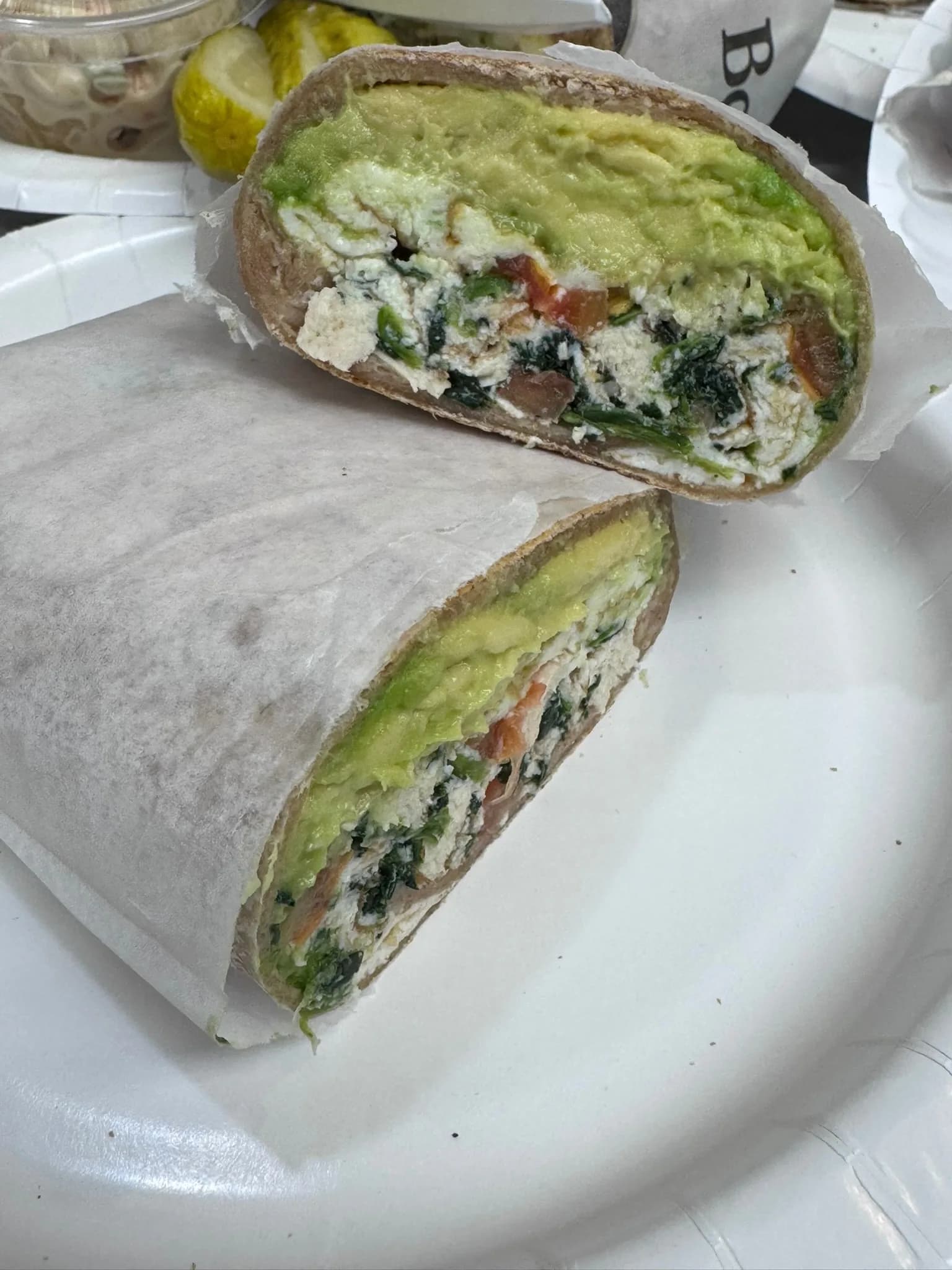 Avocado chicken wrap — grilled chicken, fresh avocado, spinach, and tomato in a whole wheat tortilla