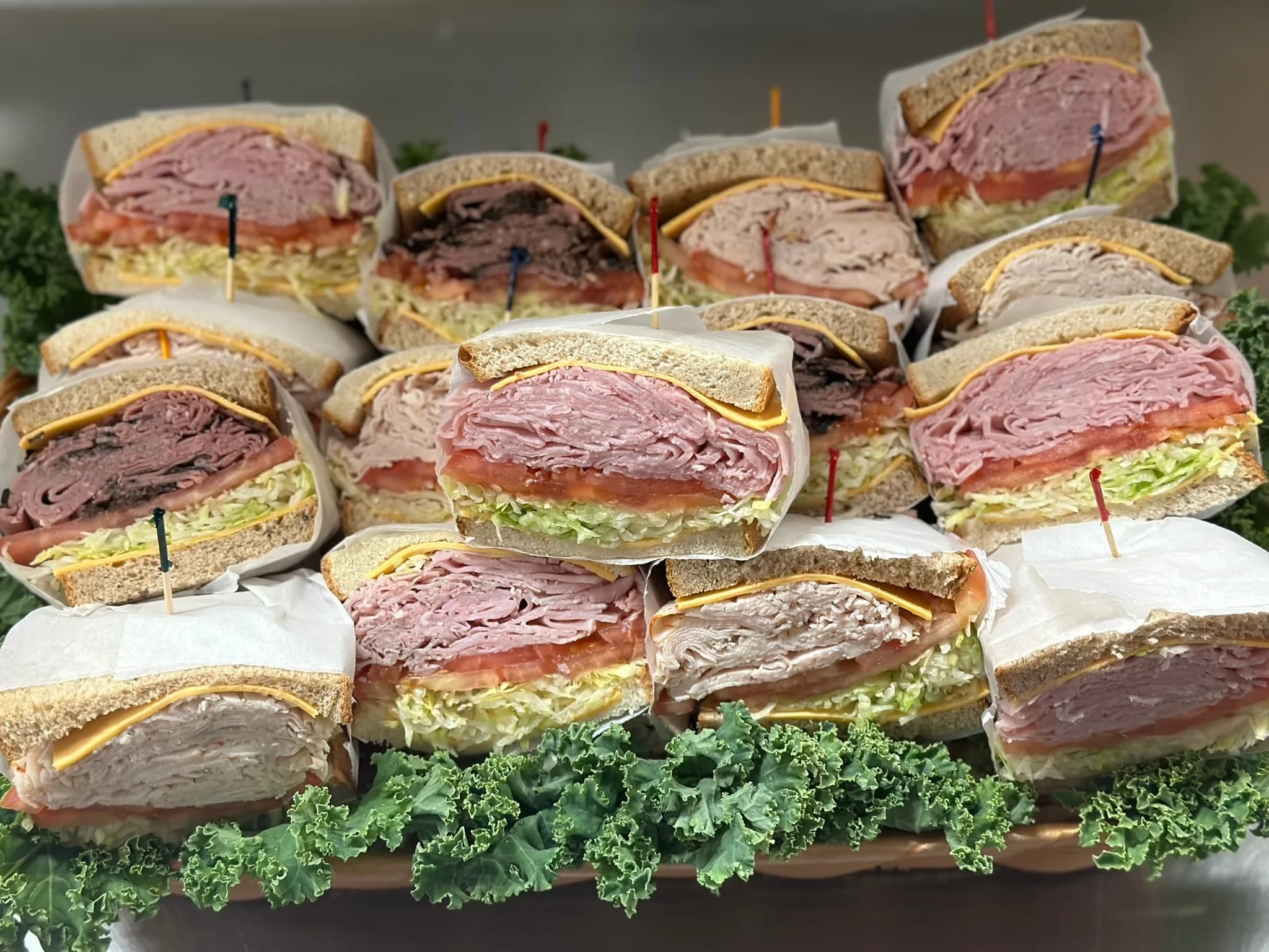 Gourmet Sandwich platter on fresh bread — sliced and arranged for the lunch crowd
