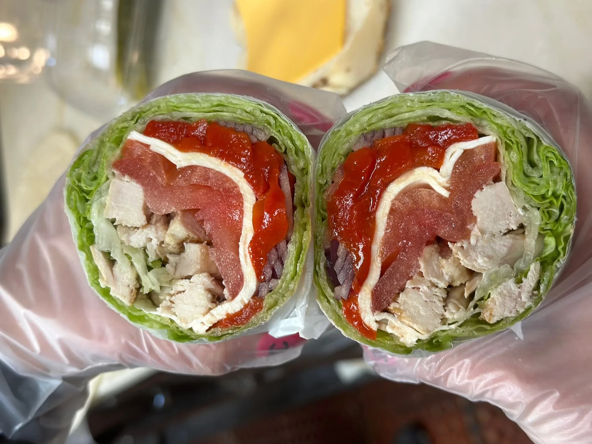 A lettuce wrap cross-section — clean, low-carb, packed with deli classics